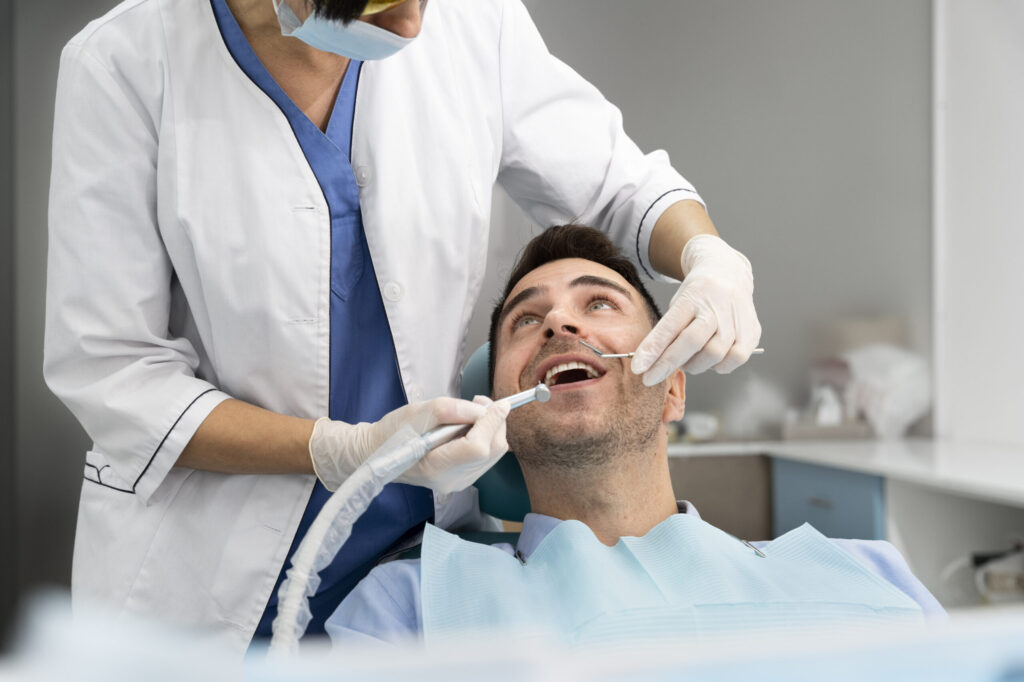 man visiting the dentist