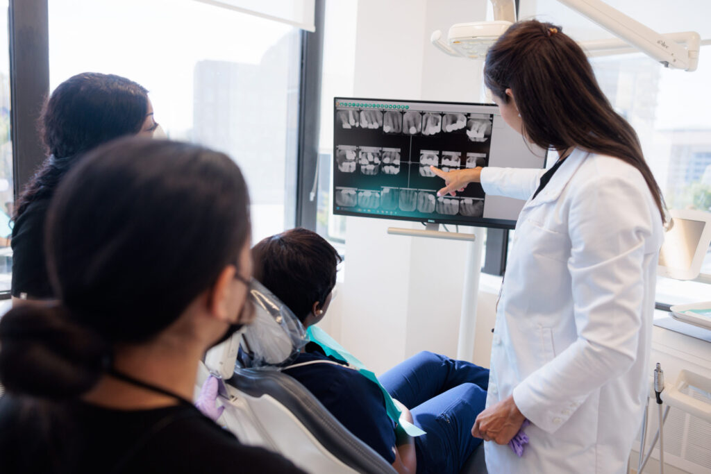 Chevy Chase dentist showing a patient their x-rays